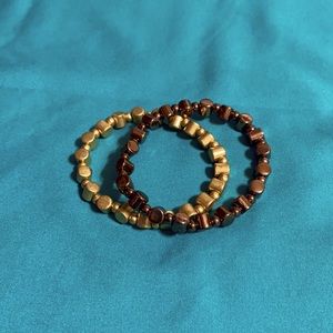 Lia Sophia stretch bracelets.